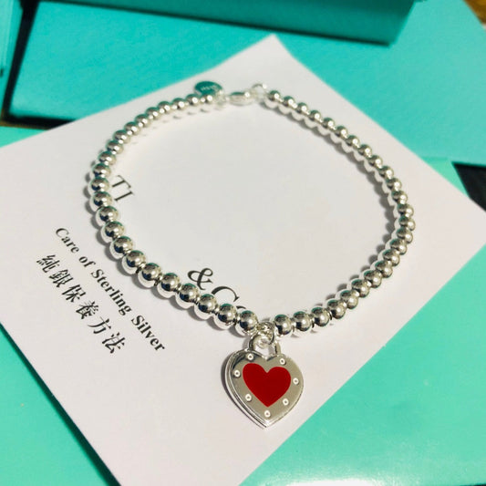 [Kaelin Vow] LOVE TIFFANY ARMBAND MIT ROTEM HERZ-TAG-PERLE