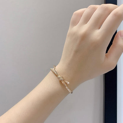 [Kaelin Vow]KNOTEN-ARMBAND MIT DOPPELTER REIHENFÜHRUNG AUS ROSÉGOLD MIT DIAMANTEN